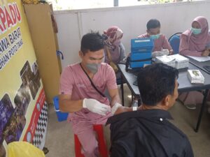 Mudik Aman dan Sehat, Polsek KP3 Tano Gelar Vaksin dan Perketat Pemeriksaan Muatan gandeng