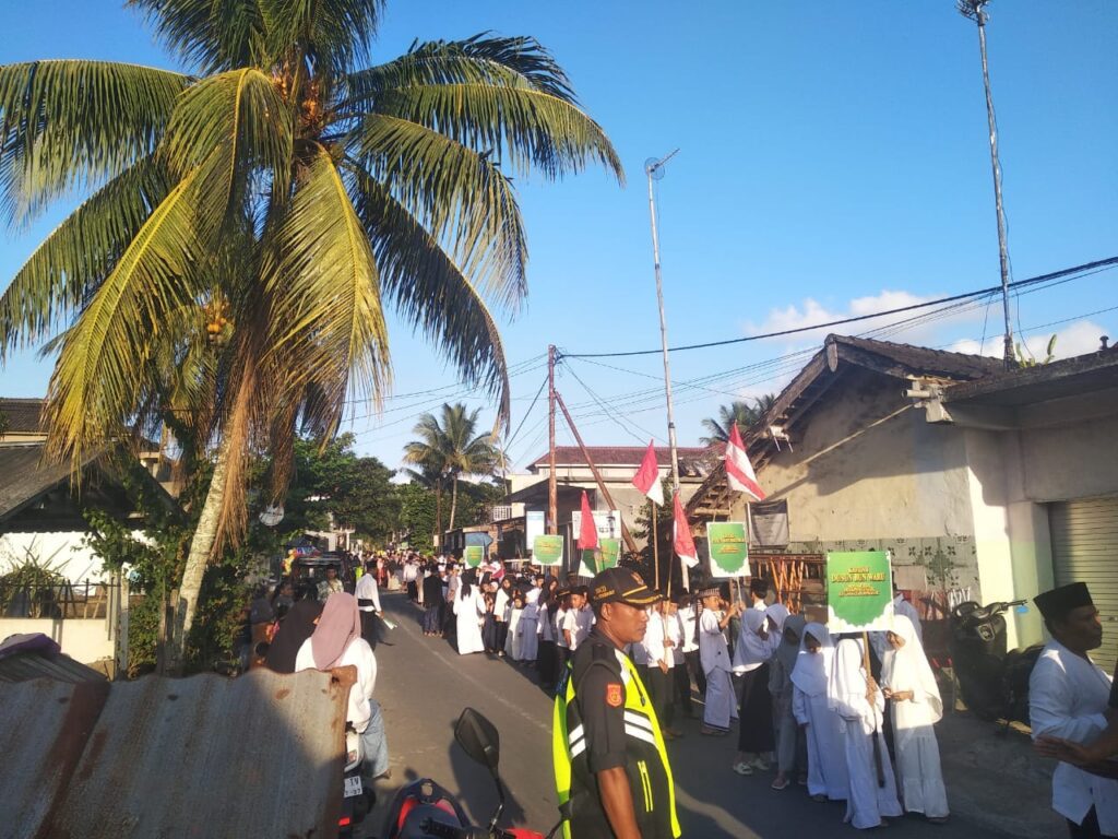 Ribuan masa turun kejalan, Kepala Desa Pengenjek Lepas Kafilah Pawai Ta’aruf MTQ